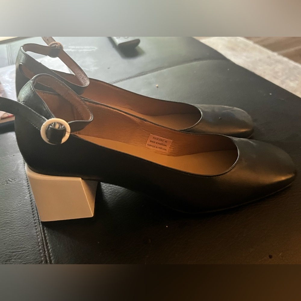 Black leather with white acrylic heel. size 41.  Made in Portuga